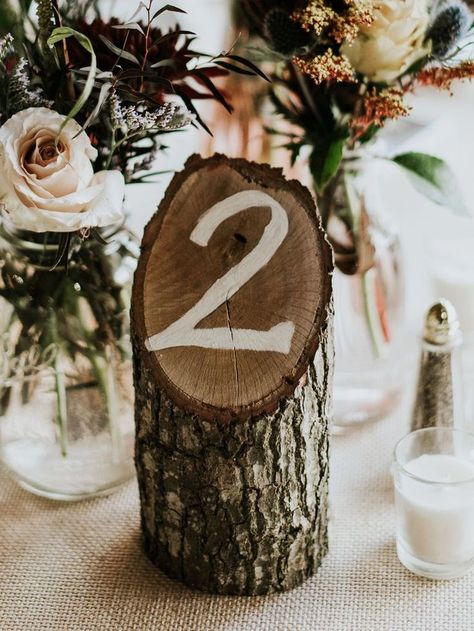 15 Unique Wedding Table Numbers We'll Help You Recreate | TheKnot.com Diy Table Numbers Wedding, Unique Table Numbers Wedding, Unique Table Numbers, Table Numbers Wedding Diy, Table Numbers Wedding Rustic, Diy Table Numbers, Tafel Decor, Wedding Numbers, Table Number Cards