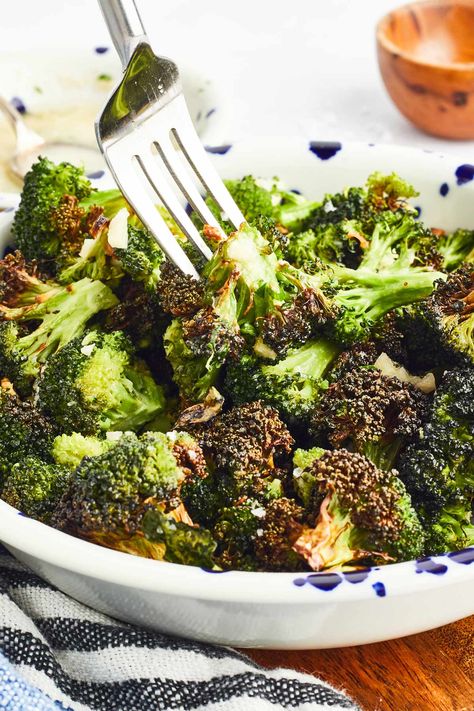 Garlic butter broccoli is an easy vegetable side dish with simple ingredients. You can roast the broccoli in the oven or use your air fryer - both methods work great! To make this recipe, you need only five ingredients and a few minutes of prep time. Garlic Butter Broccoli, Broccoli In The Oven, Broccoli Butter, Easy Vegetable Side Dish, Butter Broccoli, Broccoli Side Dish, Garlic Broccoli, Easy Vegetable Side Dishes, Vegetable Side Dish