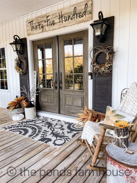 I had the best idea to make door shutters for our front doors and here is a step by step tutorial on how we did it. By using smaller shutters, that we already owned, we could add extensions to make them taller and fit them around the front doors. #DIYProject #DIYHOMEIMPROVEMENT Vintage Shutters, Porch Ceiling, Farmhouse Paint, Porch Rug, Drop Cloth Curtains, Fall Front Porch Decor, Shutter Doors, Fall Front Porch, Front Porch Decorating