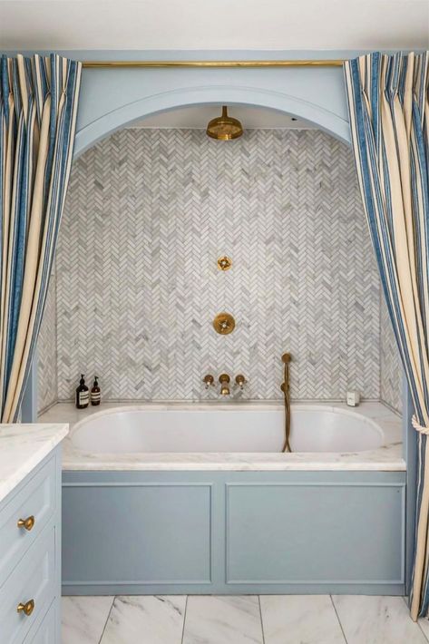 Now that's how you do shower curtains. This bold yet subtle interior makes excellent use of "bathroom" colours to create something special. The brass fittings are deliciously symmetrical, and we can't get over those inspired curtains. Photo Credit: The Times #casabyjj #interiordesign #homeaccessories #luxuryinteriors #londoninteriors #archivalrevival #britishinteriorstyle #josephinejenno #homeware #luxuryhomeware #uniquehomeware #perfectgifts #slowhomeware #slowdecor #art Palm Springs House, Bathroom Plans, Girls Bathroom, Blue Bathroom, Bathroom Inspo, Bathroom Kids, House Bathroom, Interior Trend, Kids' Bathroom