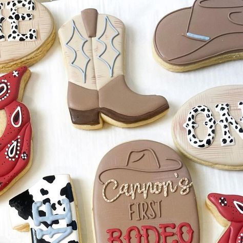 Las vegas custom cookies on Instagram: "Cannons first rodeo 🤠❤️ • • • • • • #decoratedcookies #royalicingcookies #cookiesofinstagram #cookies #cookieartist #cookieart #customcookies #cookiedecorating #sugarcookies #sugarcookiesofinstagram #dessert #hendersoncookies #lasvegascookies #lasvegascookier #lasvegasbaker #decoratedsugarcookies #selftaught #selftaughtcookier #firstrodeocookies #rodeocookies #cowboycookies #cowboybootcookies #bandanacookies #firstbirthdaycookies" My 1st Rodeo Birthday Cookies, Rodeo Cookies Decorated, My First Rodeo Birthday Cookies, Rodeo Decorated Cookies, 1st Rodeo Birthday Cookies, Cowboy Cookies Decorated, Cowboy Hat Sugar Cookies, 1st Rodeo Cookies Boy, 1st Rodeo Cookies