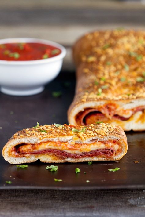 How to Make Stromboli - Recipe for how to make homemade stromboli made with pizza dough. Real dough, stuffed pepperoni salami and cheeses for an authentic Italian dinner. How To Make Stromboli, Homemade Stromboli, Italian Pizza Dough Recipe, Salami And Cheese, Authentic Italian Pizza, Savory Pies Recipes, Stromboli Recipe, Slider Sandwiches, Stuffed Bread