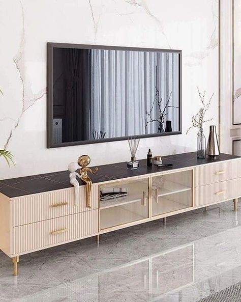 Tv Unit Design | Interior Design ✨️ . . . . . . #trendingpost #myinterior #lightingdecor #explorepost #tvwalldesign #tvunit #interiors #livingroomdesign #homesweethome #tvunitdesign #sethiglassplywood #homedecor #modernlighting #interiordecor #interiordesign #luxurylifestyle #tvcabinetdesign #luxuryhomes #icct20worldcup #miniaturecooking #zerooilrecipes #riyanparag #panchayat Tv Table Ideas Tv Stands, Luxurious Living Room Modern, Tv Unit Table, Glass Tv Unit, Gold Tv Stand, Tv Unite, Zen Room Decor, Tv Unit Designs, Modern Tv Stands