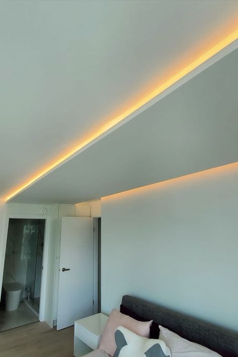 We incorporated these hidden ceiling linear light to this bedroom to provide a more luxurious look! Hidden Ceiling Lighting, Ceiling Hidden Light, Hidden Lighting Ceiling, Coved Ceiling, Drop Ceiling Lighting, Dental Office Design Interiors, Hidden Lighting, Angled Ceilings, Linear Light