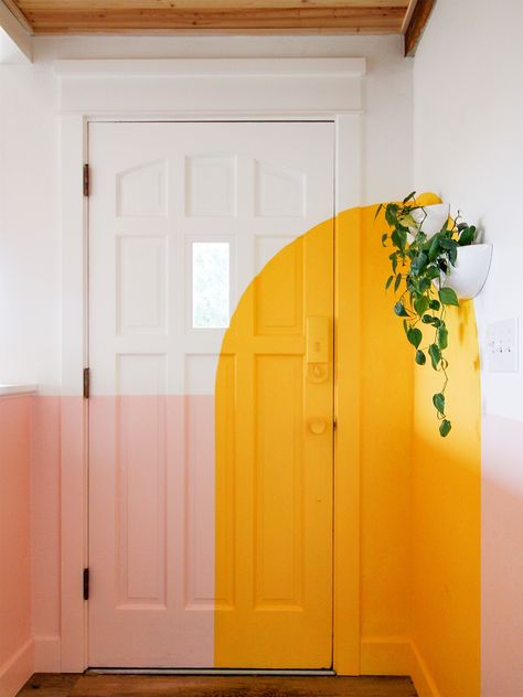 4 Paint Projects That Took This Muralist’s Home from All-Gray to Technicolor Funky Door Paint Ideas, Unique Painted Doors Interior, Retro Painted Wall Mural, All White Interiors, Entryway Mural Ideas, Painted Panel Walls, Entryway Mural Wall Art, Hallway Mural Ideas, Doorway Mural