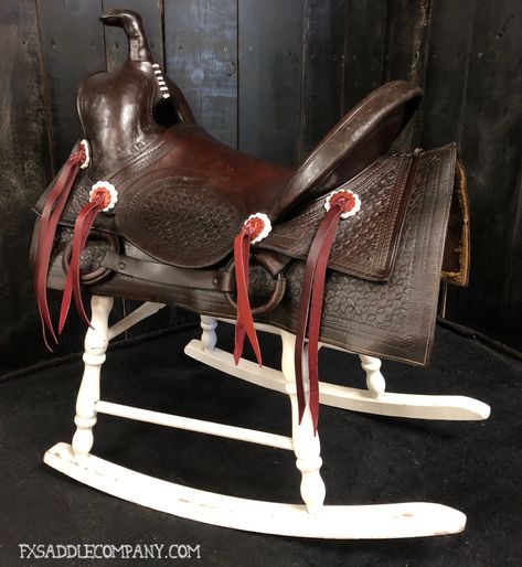 Beautiful old antique square skirt saddle that has been repurposed into a useful rocker! Many of these old saddles are beyond repair or don't fit today's wide horses....so they waste away in our barns and attics. This saddle has been given new life and just might become the favorite seat in your house! Old Saddles Decor Ideas, Repurpose Old Saddles, Display Saddle In House, Saddle Repurpose Ideas, Old Saddle Repurpose, Old Saddle Decor Ideas, Repurposed Saddle, Horse Ranch House, Saddle Decor