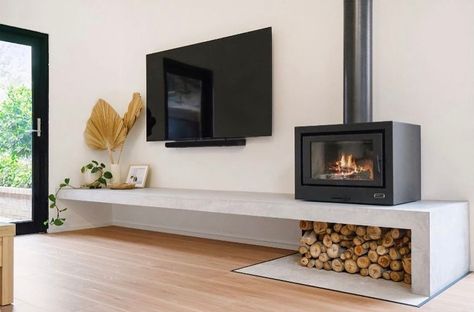 Living Room Designs Wood Stove, Wood Fire Living Room, Modern Wood Stove Living Room, Wood Fireplace Tv Wall, Wood Heater Ideas Living Rooms, Freestanding Fireplace Living Rooms, Microcement Fireplace, Wood Stoves Ideas Living Rooms, Burnished Concrete