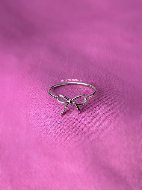 A stunning coquette style ring featuring a sweet ribbon bow tie. - Water resistant - 925 sterling silver - Will not rust or tarnish - Select desired size at checkout Rings For Birthday Gift, Dainty Rings Minimalist Jewelry Silver, Trendy Rings Silver, Girly Jewelry Silver, Silver Bow Ring, Silver Bow Jewelry, Coquette Rings, Cute Rings Silver, Pretty Rings Silver