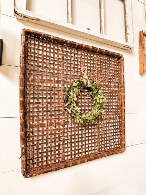 Wall Basket Decor: Stunning Decorating Ideas for Every Room How To Hang Wall Baskets, Hanging Wicker Baskets On Wall, Wicker Baskets On Wall, Baskets Above Bed, Bathroom Wall Baskets, Basket Wall Ideas, How To Decorate With Baskets, Hanging Basket Ideas, Basket On Wall