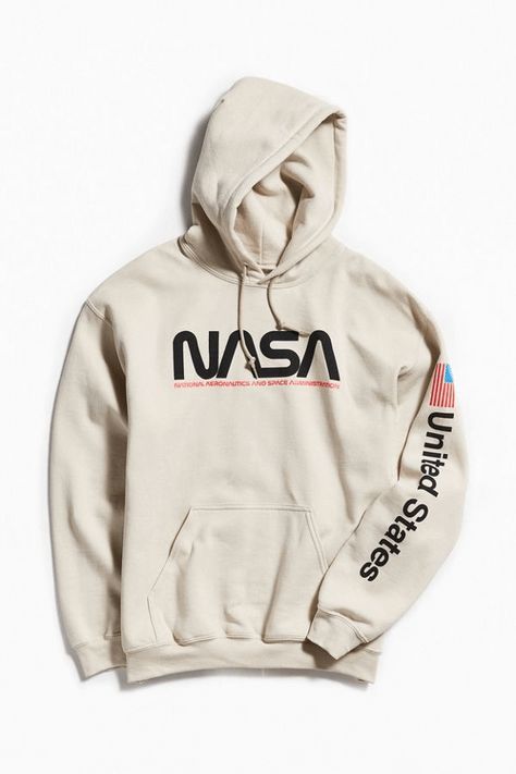 NASA clothing is popping up all over. The space agency’s signifiers can be seen on hoodies and t-shirts from mass market and high fashion alike. Is it due to logo-philia, love of science or nostalgia? We find out where to buy your own comfortable space hoodie. Nasa Clothes, Nasa Hoodie, Tokyo Street Fashion, Trendy Hoodies, Style Blazer, Space Suit, Sweatshirt Outfit, Hoodie Outfit, Mode Inspo