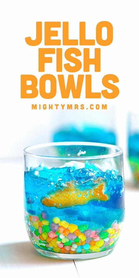 Jello Fish Bowls - A fun and edible craft or party treat using Nerds, Jello and colorful Swedish fish. Make these little fish tanks to celebrate Dr. Seuss week, shark week (use gummy sharks), an underwater themed birthday party or a summer pool party. Or heck, just because they're so adorable and yummy too! Toddlers get a kick out of this snack. Makes a great indoor, rainy day activity for summer months too. Fish Tank Dessert Cups, Swedish Fish Cake, Indoor Pool Birthday Party, Fish Bowl Jello, Jello Aquarium, Mountain Birthday, Gummy Sharks, Pool Party Snacks, Jello Jigglers