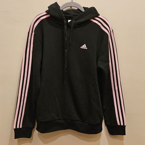 New With Tags, Never Worn! Black Hoodie With The Three Adidas Stripes In Pink And A Pink Logo On The Left Chest. Please Feel Free To Ask Questions And Consider Bundling! Save 15% When You Bundle Three Items Or More!! Black Crop Hoodie, Adidas Hoodie Women, Adidas Cropped Hoodie, Running Hoodie, Goth Clothing, Black And White Logos, Womens Sweatshirts Hoods, Adidas Crop, Adidas Pink