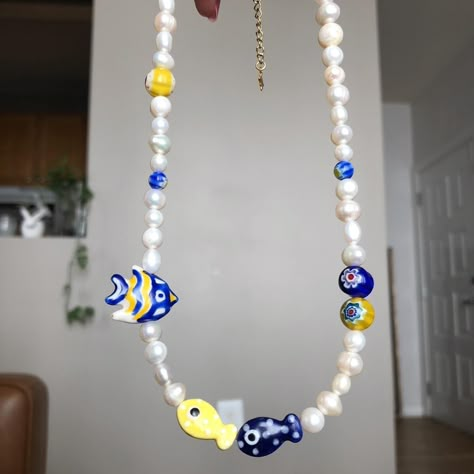 ✨🐠🐟 School of Fish Pearl Necklace 🐠🐟✨

Cultured... - Depop Ceramic Fish Necklace, Gold Trinkets, Fish Bracelet, Eyeglass Strap, School Of Fish, Fish Beads, Fishing Bracelet, Indie Jewelry, Fish Necklace