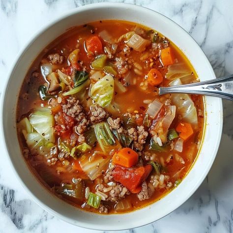 Cabbage Roll Soup - Yeyfood.com: Recipes, cooking tips, and kitchen hacks for home cooks of all levels Deep Dish Pizza Bites, Healthy Cabbage Soup, Hacks For Home, Cabbage Stew, Cabbage Roll Soup, Lipton Onion Soup Mix, Cabbage Roll, Soup With Ground Beef, Cabbage Rolls Recipe