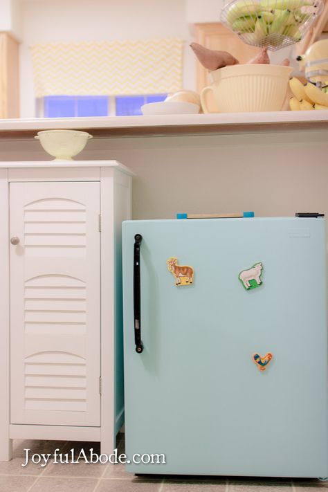 Fully functional Montessori toddler kitchen.- a tiny kitchen with everything they need!!!! Montessori Kitchen Station With Mini Fridge, Mini Fridge Makeover, Loft With Desk, Making Snacks, Helper Stool, Montessori Kitchen, Toddler Bathroom, Fridge Makeover, Montessori Work