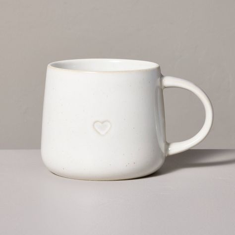 Whether it's Valentine's Day or any other occasion, refresh yourself or a loved one with the 16-Ounce Reactive Glaze Stoneware Mug with Embossed Heart from Hearth & Hand™ with Magnolia. This white mug features an embossed heart for a lovely look. Made of stoneware, this handcrafted mug is suitable for both hot and cold beverages. You can toss it in the dishwasher for easy cleanup and reheat drinks with its microwave-safe design. Hearth & Hand™ with Magnolia: Gather • Create • Enjoy Hearth & Hand With Magnolia, Reactive Glaze, Hearth And Hand, Stoneware Mugs, White Mug, Cold Beverages, Serveware, Sour Cream, Cold Drinks