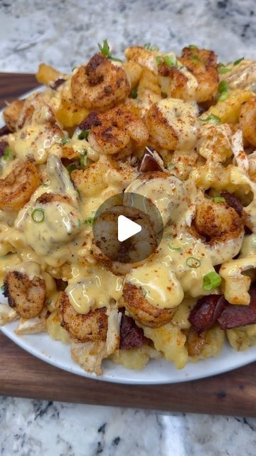 Renzo on Instagram: "Loaded Seafood Cheesy fries! 🍤  The NFL season starts this week and you’re gonna need appetizers! Here’s a throwback to one of my favorite appetizers from last season, pick your teams now!! 😂🏈  Full ingredient list:  1 lb shrimp  8 oz lump crab meat  1/2 lb turkey sausage (diced)  1-2 lb frozen french fries @oreida  1-2 tsp old bay seasoning  1-2 tsp garlic powder  1-2 tsp smoked paprika  Green onion to garnish  (Adjust seasoning amount to use throughout entire recipe)   For cheese sauce:  1 can evaporated carnation milk  8 oz shredded colby jack cheese  4-6 oz velveeta cheese  Season to taste  Preferred frying oil" Seafood Fries Recipe, Loaded Crab Fries, Seafood Loaded Fries, Recipe For Cheese Sauce, Seafood Fries, Carnation Milk, Fries Recipes, Crab Mac And Cheese, Crab Fries