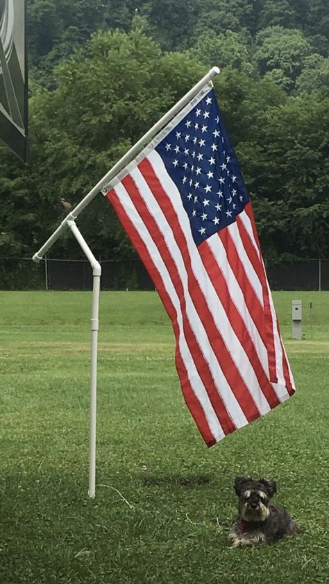 DIY Campground Flag Pole - 5 Easy Steps - Lifestyle & Travel Blog Diy Flag Holder, Diy Campground, American Flag Pole In Yard, Flag Pole Ideas Diy, Pvc Flag Pole Diy, Pvc Flag Pole Camping, Pond Pavilion, Diy Flag Pole, Diy Truck Flag Pole Mount