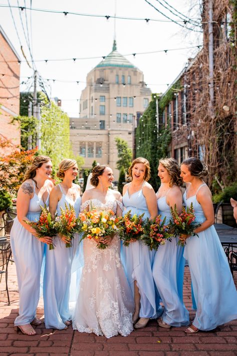 Bridal bouquet, orange and blue wedding, ranunculus, tulip, carnations, poppy, feverfew, tweedia, Italian ruscus, sword fern, eucalyptus, dusty blue ribbon, Bridesmaids, orange snapdragons, bridesmaid bouquets, light blue dress, Spring wedding, summer wedding, The Venue CU, Champaign-Urbana wedding, Illinois wedding, central Illinois wedding, midwest wedding, wedding flowers, J.Blu Design, Peoria wedding, T&B Photography, bridal party, bridesmaid dresses, colorful bouquet, wedding bouquet, bride Snapdragon Bouquets, Blue And Orange Bridesmaid Dresses, Light Blue And Orange Wedding, Orange Snapdragon, Orange Blue Wedding, Blue Tweedia, Blue Yellow Weddings, Urbana Illinois, Bud Vases Arrangements