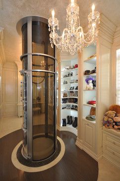 Closet with vacuum elevator. Awesome! -- Luxury home decor, interior design, and decorating ideas -- Home Gym Basement, Dressing Room Closet, Amazing Closets, Walk In Closet Design, Closet Room, Dream Closets, Closet Inspiration, Room Closet, Dressing Room Design