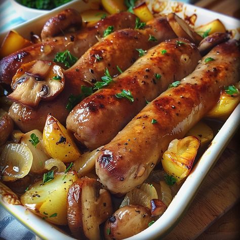 Sausage, Potato, and Mushroom Bake Ingredients: 6 sausages (your choice) 1 kg (2.2 lbs) potatoes, cut into chunks 250 g (8.8 oz) mushrooms, sliced 2 onions, sliced into rings 3 garlic cloves, minced 3 tablespoons olive oil 1 tablespoon Dijon mustard 1 tablespoon honey Salt and pepper, to taste Fresh parsley, chopped (for garnish) Instructions: Preheat the Oven: Preheat your oven to 200°C (400°F). Prepare the Ingredients: Wash and cut the potatoes into chunks. Slice the mushrooms. Slice the ... Honey Garlic Sausage Dinners, Italian Sausage Meals, Honey Garlic Sausage, Potato And Mushroom, Mushroom Bake, Mushroom Food, Potatoes Mushrooms, German Food Authentic, Sausage Potato