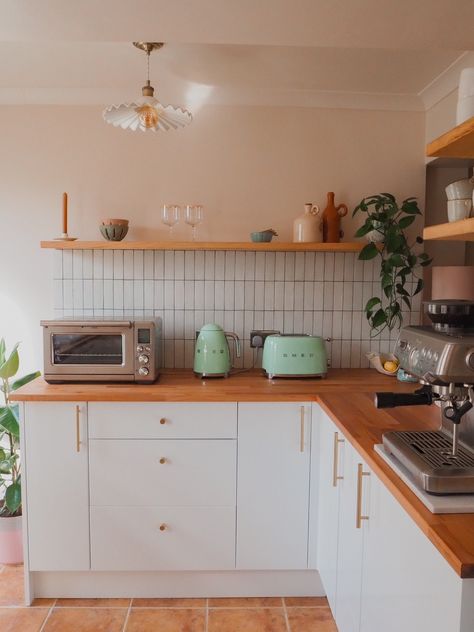 same angle, different view of the kitchen ✨ I love this corner with th... | Kitchen | TikTok Green Smeg, Neutral Aesthetic, Floating Shelf, White Kitchen, The Kitchen, Brass, Wood, Green, White