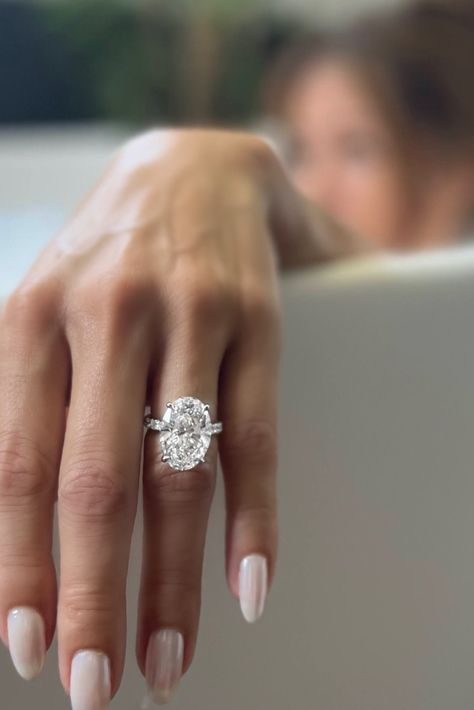 12 carat oval ring shown on hand Diamond Oval Ring Engagement, Engagement Ring Large Diamond, 8ct Oval Engagement Ring, 1.4 Ratio Oval Diamond, 5 Ct Oval Diamond Ring, Celebrities Wedding Rings, 5 Carat Diamond Ring Oval, Engagement Rings Large Diamond, 7ct Engagement Ring