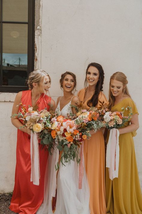 Mismatched bridesmaid dresses in coral red, muted orange, and mustard yellow  #weddingflowers #bridesmaids #bouquet Mismatched Bridesmaid Dresses Pink, Mustard Yellow Wedding, Bridesmaid Dresses Pink, Bridesmaids Spring, Yellow Wedding Inspiration, Summer Bridesmaids, Warm Color Palette, Orange Bridesmaid, Coral Bridesmaid Dresses