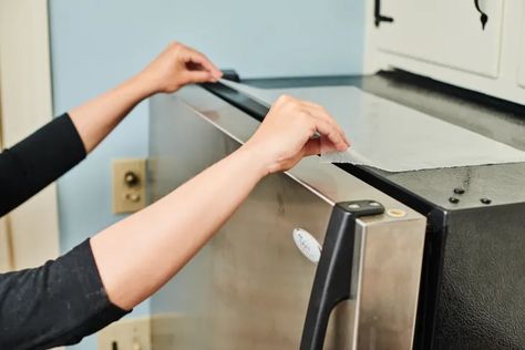 Wax Paper Trick for Grease and Dust on Top of Fridge and Cabinets | Kitchn On Top Of Fridge, Top Of Fridge, Fridge Smells, Squeaky Door, Ingenious Ideas, Homemade Brunch, Fridge Odor, Top Of Refrigerator, Top Of Cabinets