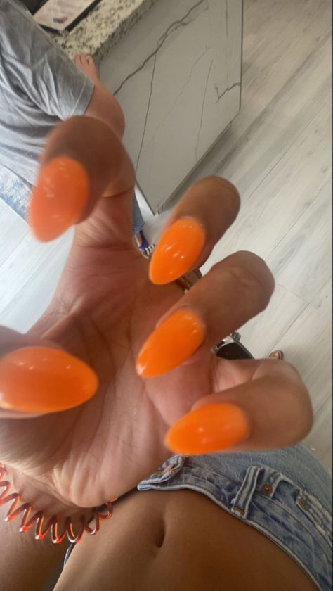 Nail Inspiration Almond Summer, Orange Almond Shaped Acrylic Nails, Sold Color Almond Nails, Cute Light Orange Nails, Nail Inspo April 2024, Solid Color Nails Orange, Summer Acrylic Almond Nails, Almond Shaped Orange Nails, Papaya Orange Nails