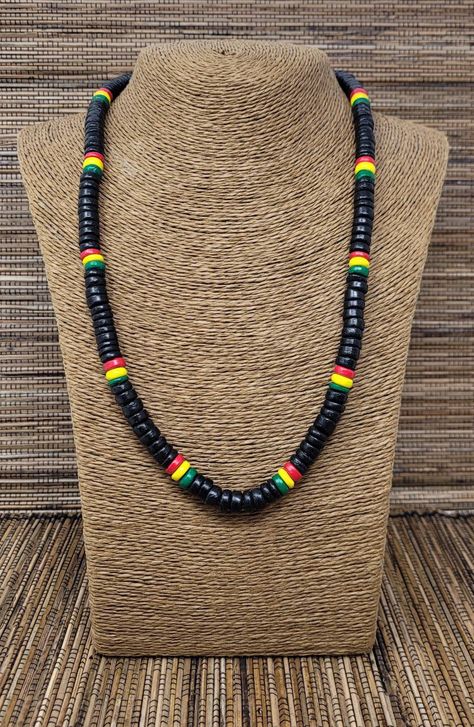 "Rasta Necklace. Wooden Necklace. Unique exotic design. Handmade with rasta color wooden beads and cord. Unisex Design. Long Necklace. 23\" Inches Around the neck FAST & FREE SHIPPING! *First Class Mail Visit my Etsy Shop to see more Designs! Handmade Rasta Wooden Earrings, Rasta Bracelets and Necklaces. Click here to see more designs: https://www.etsy.com/shop/FreedomLifeStyle" Rasta Necklace, Rasta Jewelry, Rasta Culture, Wooden Bead Jewelry, Mens Beaded Necklaces, Rasta Colors, Necklace Wood, Wooden Necklace, Wood Necklace