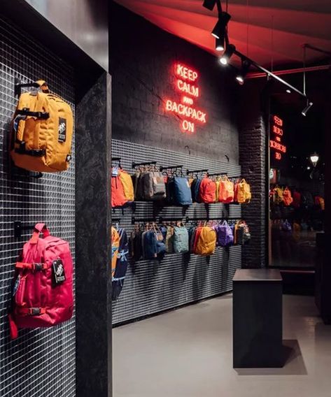 Bag Display Ideas Retail, Backpack Store, Lighting Mood, Clothing Store Interior, Urban Backpack, Spain Design, Clothing Store Design, Store Concept, Metal Grid