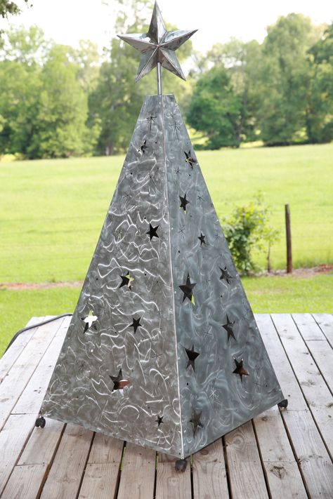 Metal Christmas tree made from angle iron for frame and galvanized sheet metal. Outdoor Metal Christmas Trees, Sheet Metal Christmas Tree, Metal Christmas Tree Decor, Metal Deer Christmas Decor, Christmas Welding Projects, Christmas Metal Art, Metal Christmas Decor, Metal Trees, Tin Projects