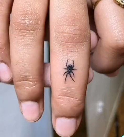 Hand On Neck Tattoo, Finger Tattoos Spider Web, Spider Tattoo On Finger, Spider On Finger Tattoo, Goth Hand Tattoos Men, Finger Tattoos Side Of Finger, Black Widow Finger Tattoo, Finger Spider Tattoo, Eyeball Finger Tattoo