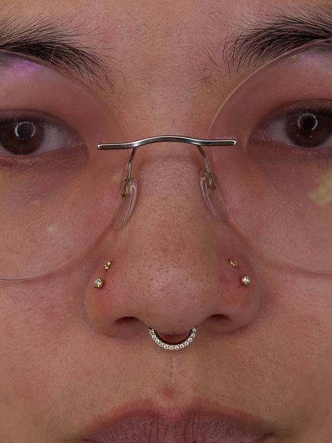 YOU CAN ADD MORE PIERCINGS TO YOUR NOSE 😱  LOWER PAIRED NOSTRIL PIERCING BY @hippygypsyink  Soho, Union Square, and Williamsburg  11AM-9PM 7 DAYS A/W🕘 WALK-INZ OR BOOK ONLINE..📕 TATTOOS & PIERCINGS, NO ATTITUDE, NO MISERABLE HOOPS TO JUMP THROUGH....🚫  WALK-INZ WELCOME OR BOOK ONLINE AT  ⚔️livebytheswordtattoo.com⚔️ . . . . #nostrilpiercing #nosepiercing #piercings #doublepiercing #williamsburg #brooklyn Round Face Piercing, Septum And Both Nostril Piercing, Right Side Nose Piercing, Nose Hoop Aesthetic, Stacked Nose Piercing, Nostril Piercing Both Sides, Two Nose Piercings On Both Sides, Piercings Idea, Two Nose Piercings