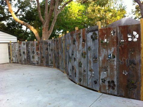 Pinned Image  Industrial Chic- reclaimed 100 year old tin roofing repurposed into a fantasy privacy fence. Tin Fence Ideas, Tin Fence, Tin Roofing, Corrugated Metal Fence, Old Garden Tools, Barn Tin, Garden Fences, Roofing Ideas, Corrugated Metal Roof