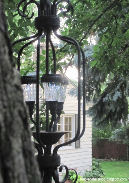 DIY Outdoor Solar Chandelier - use an old chandelier from a thrift store and solar garden stakes from Walmart Solar Chandelier Outdoor, Diy Outdoor Chandelier, Upcycled Chandelier, Chandelier Outdoor, Campsite Decor, Garden Lighting Diy, Gothic Farmhouse, Solar Chandelier, Solar Lamps