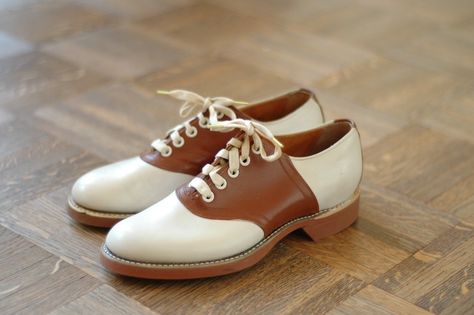 1940's brown and white saddle oxfords Oxford Saddle Shoes, Retro Leather Oxfords With Goodyear Welting, 1950s Saddle Shoes, Dutton Outfits, Retro Brown Oxfords, Retro Brown Leather Oxfords, Vintage Brown Wingtip Oxfords, Vintage Winter Fashion, Vintage Brown Goodyear Welted Oxfords