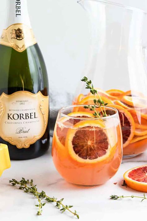 These 10 sparkling New Year's Eve cocktails are tailor-made for your glittering New Year's Eve cocktail party! They're easy to make in batches, elegantly garnished, seasonably mixed with flavors like pear, blood orange, cranberry and ginger – with some bubbly, classic favorites and special surprises too! Perfect for the host or hostess who wants to elevate their cocktail menu and impress every guest! Bar Business Ideas, Blood Orange Sangria, Elegant Cocktails, Champagne Sangria, Alcoholic Recipes, New Years Eve Drinks, Orange Champagne, Brunch Celebration, Wine And Pizza