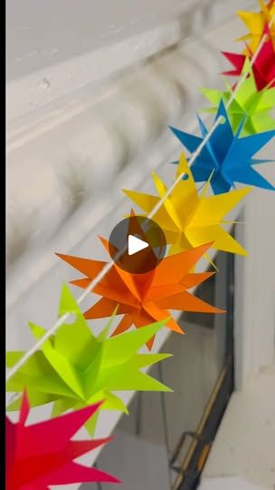 292K views · 41K reactions | ✨🌟⭐️ DIY paper star garland | How to make a star garland | How to cut a star | Star decoration ideas

🌟 Add a burst of color and creativity to your space with this vibrant DIY paper star garland! In this video, I’ll guide you step-by-step through creating these stunning 3D paper stars that you can easily string together for a beautiful garland. Perfect for parties, holidays, or just a fun crafting day at home! 🌟

🎨 What You’ll Need:
 • Colored paper
 • Scissors
 • String or twine
 • Hole punch

👇Comment “link” if you want to skip the folding. I will send you a template to your DM. 

✨ Decor Ideas:
Hang this garland across a mantle, doorway, fireplace or wall to add a pop of color to any room. You can even customize it with different colors and sizes for a How To Make Paper Stars Step By Step, Wall Decoration Ideas With Paper Diy, Star Decoration Ideas, Paper Star Garland, 3d Paper Stars, Xmas Crafts Kids, 3d Paper Star, Geometric Origami, Paper Wall Hanging