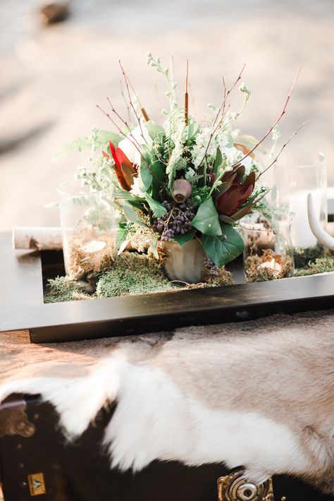 Wedding table center piece - antlers, doe skin, moss, candles, earth, wind, fire, water Styled by Wright Event Services Photography: Andrea Pesce Photography - www.andreapesceph... Read More: www.stylemepretty... Wedding Table Center Piece, Earth Wind Fire Water, Earth Wind & Fire, Earth Wind, Water Party, Fire Water, Event Services, Table Centers, Center Pieces