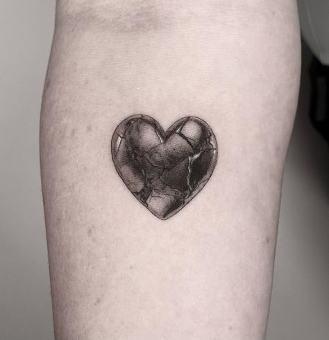 Cracked stone heart 💔 chosen from one of my flash sheets. For @makinzeehall. Thanks for coming. It was a good time 😊 - Link in bio to book - #tattoo #blackandgreytattoo #realismtattoo #brokenhearttattoo #hearttattoo #stonetattoo #brokentattoo #crackedheart #blackandgreyrealism #denvertattoo #denvertattooartist #realistictattoo #tattooartist #tattoos #microrealism #fineline Stone Heart Tattoo, Stone Tattoo, Flash Sheets, Tattoos For Black Skin, Book Tattoo, Thanks For Coming, Realism Tattoo, Stone Heart, Small Heart