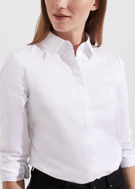 WHY WE LOVEThe workwear staple. Every wardrobe requires a classic cotton shirt like Victoria. FIT AND DETAILSLong, slim-cut sleeves and cuff detailingSmart aestheticMade from a cotton blend fabricDiscreet front buttonsCollar neckHOW TO STYLEDesigned to effortlessly slot in alongside your office wardrobe, style with tailored separates or wear with jeans and the Georgie jacket for a polished look. Perfect White Shirt, White Cotton Shirt, Office Wardrobe, White Shirt Blouse, Beachwear Skirt, Wardrobe Needs, British Fashion, Denim Coat Jacket, Loungewear Shorts