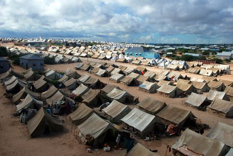 Refugee Camps: From Temporary Settlements to Permanent Dwellings | ArchDaily Refugee Camp, Metropolis, Tent Camping, Rio De Janeiro, Dolores Park, Tent, Around The Worlds, Camping, Stock Photos