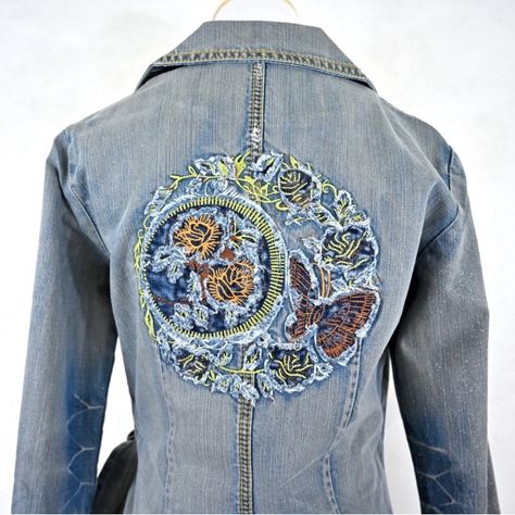 Custo Barcelona Denim Jacket Color: Medium Blue Wash Features: Rare & Unique! Retro 2000s High End Designer Jacket. Solid Pattern Design. Modern Fitted Style. Decorated With Jean Whiskers, Glitter, Embroidered Design And Embellished With Metal Studs. Front Tie Closure. V-Neckline With Lapels. Long Sleeve. Machine Washable Or Dry Clean. Made In Thailand Material: 100% Cotton Condition: New With Tags (Nwt) Ladies Size 6 (40 European) Measurements: Bust 32" Waist 27" Length 23" Cs083 Denim Upcycle Clothing, Reworked Denim Jacket, Barcelona Jacket, Denim Jeans Ideas, Retro 2000s, Embroidered Jean Jacket, Embellished Denim Jacket, Quilted Sweatshirt, Upcycle Clothes Diy