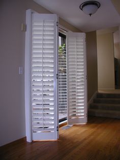 Sliding glass door shutters are both gorgeous and easy to use! Click for a gallery of custom bi-fold shutters from StanfieldShutter.com Sliding Door Window Coverings, Sliding Glass Door Shutters, Sliding Door Shutters, Sliding Glass Door Window Treatments, Ideas Armario, Door Treatments, Sliding Glass Door Window, Sliding Door Window Treatments, Door Window Covering