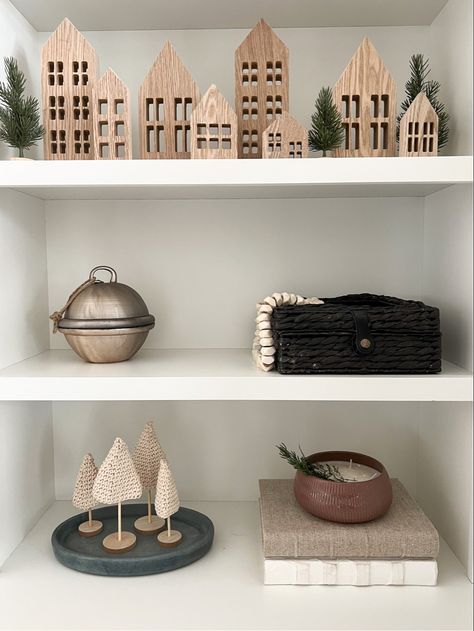 Kayla Haven is the queen of shelf decor! Shop the look by clicking the link! Living Room Urban, Božićne Dekoracije, Houses Decor, Creative Bookcases, Xmas Decorations Diy, Shelf Decor Living Room, Christmas Houses, Bookcase Styling, Neutral Christmas Decor