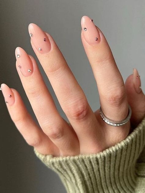 Simple rhinestone accent on nude nails Rhinestone Accent Nail Simple, Gel Rhinestone Nails, Simple Jewl Nails, White Nail With Diamonds, Short Nails Crystals Designs, Jewel Accent Nails, Minimal Gem Nails, Minimalist Nails With Rhinestones, Simple Bejeweled Nails