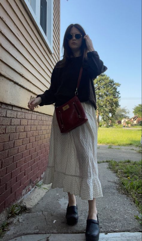 Cashmere sweater. Polka dot maxi skirt. Dansko clogs. Red leather purse. Clogs And Skirt Outfit, Styling Dansko Clogs, Black Dansko Clogs Outfit, Clogs And Dress, Mia Clogs Outfit, How To Wear Dansko Clogs, Dansko Clogs Outfit Professional, How To Style Dansko Clogs, Leather Clogs Outfit