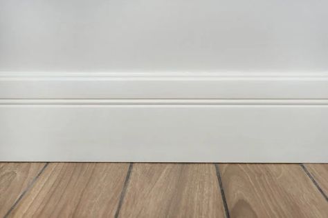 Can Baseboards Be Too Tall? The Sizing Rule to Live By Base Board Trim, Installing Vinyl Plank Flooring, Tall Baseboards, Wood Baseboard, Baseboard Styles, Baseboard Trim, Baseboard Molding, Floor Trim, Trim Work